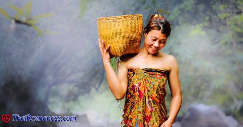 Farmer Thai woman carrying basket