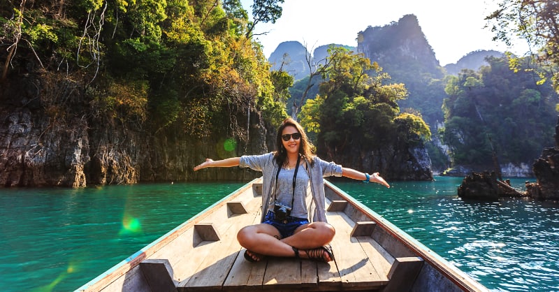 Thai woman on boat in Thailand